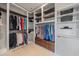 Large walk-in closet with ample shelving and hanging space at 4136 Roberts Point Cir, Sarasota, FL 34242