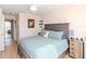 Bright bedroom with a queen-size bed and ample closet space at 4207 Caddie E Dr # 202, Bradenton, FL 34203