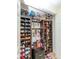 Well-organized closet with shoe storage and hanging racks at 4207 Caddie E Dr # 202, Bradenton, FL 34203