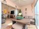 Enclosed balcony with access to living room and lake view at 4207 Caddie E Dr # 202, Bradenton, FL 34203