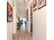 Bright entryway with wood-look floors and Gathering photos at 4207 Caddie E Dr # 202, Bradenton, FL 34203