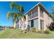 Tan building with screened balcony overlooking a lake at 4207 Caddie E Dr # 202, Bradenton, FL 34203