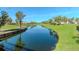 Peaceful golf course community with serene lake views and lush landscaping at 4207 Caddie E Dr # 202, Bradenton, FL 34203