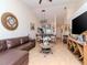 Spacious living room with L-shaped sectional sofa and open floor plan at 4207 Caddie E Dr # 202, Bradenton, FL 34203