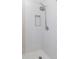 Clean shower with pebble flooring and updated fixtures at 4207 Caddie E Dr # 202, Bradenton, FL 34203