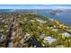 Aerial view showcasing home's waterfront location and surrounding area at 5112 Jungle Plum Rd, Sarasota, FL 34242