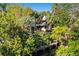 Aerial view of house and private dock at 5112 Jungle Plum Rd, Sarasota, FL 34242