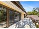 Private balcony with sliding glass doors and tranquil views at 5112 Jungle Plum Rd, Sarasota, FL 34242