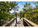 Wooden dock providing serene waterway access at 5112 Jungle Plum Rd, Sarasota, FL 34242