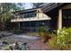 Two-story home with brick walkways and lush landscaping at 5112 Jungle Plum Rd, Sarasota, FL 34242