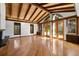 Spacious living room with hardwood floors, vaulted ceilings and built-in shelving at 5112 Jungle Plum Rd, Sarasota, FL 34242