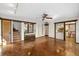 Spacious living area with hardwood floors and access to a patio at 5112 Jungle Plum Rd, Sarasota, FL 34242