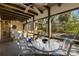 Relaxing screened porch with outdoor seating and backyard views at 5112 Jungle Plum Rd, Sarasota, FL 34242