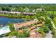 Aerial view showcasing the community's layout and proximity to the lake at 5369 Lake Arrowhead Trl # 17A, Sarasota, FL 34231