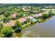 Aerial view of Lake Arrowhead community, highlighting its waterfront setting and pool at 5369 Lake Arrowhead Trl # 17A, Sarasota, FL 34231