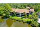 Aerial view of condo community showing building location and surrounding landscape at 5369 Lake Arrowhead Trl # 17A, Sarasota, FL 34231
