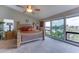 Spacious bedroom with lake view and ensuite bath at 5369 Lake Arrowhead Trl # 17A, Sarasota, FL 34231