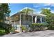 Charming light teal home with a wrap around porch at 5369 Lake Arrowhead Trl # 17A, Sarasota, FL 34231