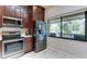 Modern kitchen with stainless steel appliances and lots of counter space at 5369 Lake Arrowhead Trl # 17A, Sarasota, FL 34231