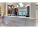 Open kitchen with breakfast bar and modern finishes at 5369 Lake Arrowhead Trl # 17A, Sarasota, FL 34231