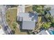 Overhead view of single Gathering home and surrounding landscape at 5384 Sarapointe Ct, Sarasota, FL 34232