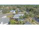 Aerial view of the house and surrounding neighborhood at 5384 Sarapointe Ct, Sarasota, FL 34232