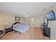 Bright bedroom featuring a comfortable bed and plenty of natural light at 5384 Sarapointe Ct, Sarasota, FL 34232