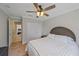Cozy bedroom with a double bed and access to another bedroom at 5384 Sarapointe Ct, Sarasota, FL 34232
