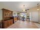 Living room with hardwood floors and wooden furniture at 5384 Sarapointe Ct, Sarasota, FL 34232