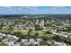 Community overview with golf course and lake at 5507 Fair Oaks St # 3-C, Bradenton, FL 34203