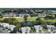 Aerial view of a community with golf course and lake at 5507 Fair Oaks St # 3-C, Bradenton, FL 34203