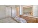 Bedroom with full-size bed, dresser, and mirrored closet at 5507 Fair Oaks St # 3-C, Bradenton, FL 34203