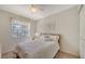 Cozy bedroom with full-size bed and neutral decor at 5507 Fair Oaks St # 3-C, Bradenton, FL 34203