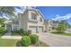 Front view of condo with landscaping and walkway at 5507 Fair Oaks St # 3-C, Bradenton, FL 34203