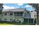Back exterior view of condo with screened balcony at 5507 Fair Oaks St # 3-C, Bradenton, FL 34203