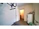 Garage with water heater and extra storage at 5507 Fair Oaks St # 3-C, Bradenton, FL 34203