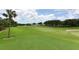Landscaped golf course with lush greens at 5507 Fair Oaks St # 3-C, Bradenton, FL 34203