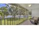 Screened lanai overlooking a peaceful lake at 5507 Fair Oaks St # 3-C, Bradenton, FL 34203