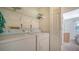 Laundry room with side-by-side washer and dryer at 5507 Fair Oaks St # 3-C, Bradenton, FL 34203