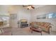 Living room with TV and comfortable seating at 5507 Fair Oaks St # 3-C, Bradenton, FL 34203
