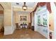Elegant lobby with seating area and access to outdoor patio at 5507 Fair Oaks St # 3-C, Bradenton, FL 34203