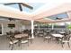 Covered outdoor seating area with ceiling fans at 5507 Fair Oaks St # 3-C, Bradenton, FL 34203