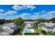 Community pool with lounge chairs and gazebo at 5507 Fair Oaks St # 3-C, Bradenton, FL 34203