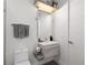 Modern bathroom with floating vanity and sleek fixtures at 5906 Larchwood Ave, Sarasota, FL 34231