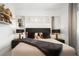 Bright bedroom featuring a large bed and stylish decor at 5906 Larchwood Ave, Sarasota, FL 34231