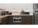 Well-equipped kitchen featuring stainless steel appliances and ample counter space at 5906 Larchwood Ave, Sarasota, FL 34231