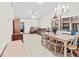 Combined living and dining area with ample seating at 6135 Heritage Ln # 6135, Bradenton, FL 34209