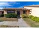 Front view of charming condo with landscaping at 6135 Heritage Ln # 6135, Bradenton, FL 34209