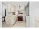 Kitchen laundry area with washer, dryer, and cabinets at 6135 Heritage Ln # 6135, Bradenton, FL 34209
