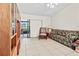 Living room with tiled floors and sliding glass doors at 6135 Heritage Ln # 6135, Bradenton, FL 34209